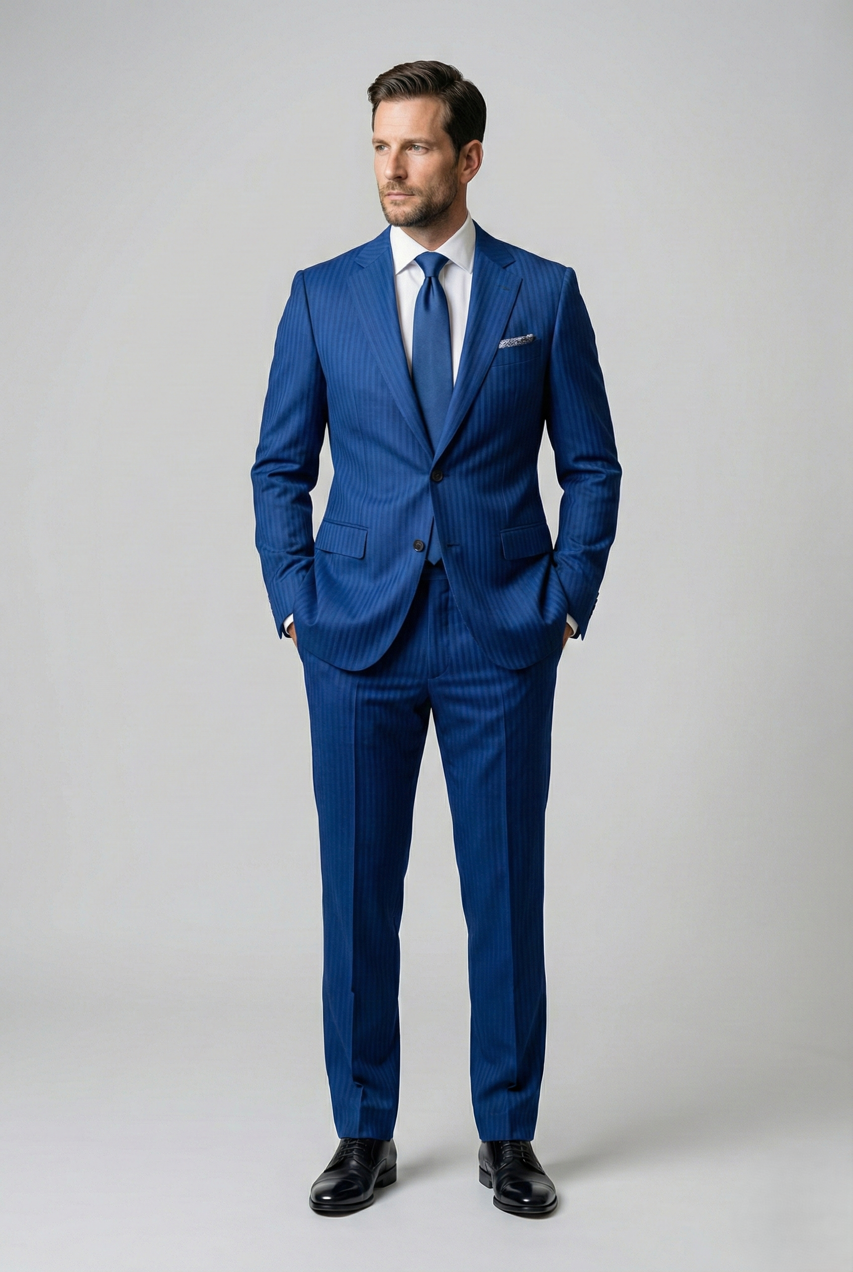 Abito Uomo 2 Bottoni con Spacchi Spinato